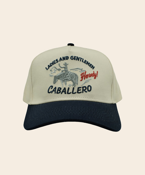 Front of Caballero Classic Hat, Beige and black cap with Ladies and Gentlemen caballero design.